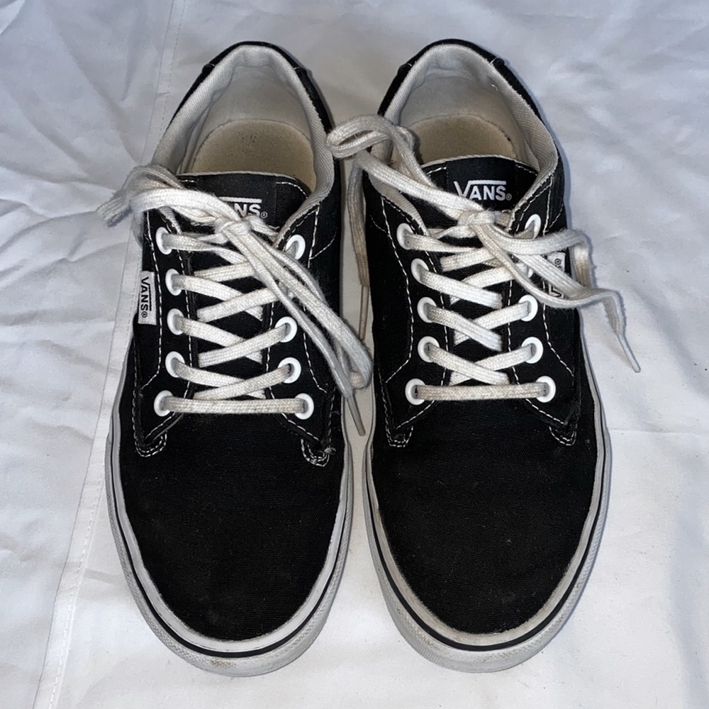 Black and white lace up Vans
